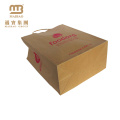 China Wholesale Eco Friendly Reusable Custom Color Shopping Carry Brown Kraft Paper Bag Manufacturer